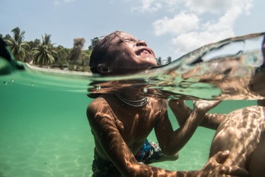 Picture of a child swimming in the water