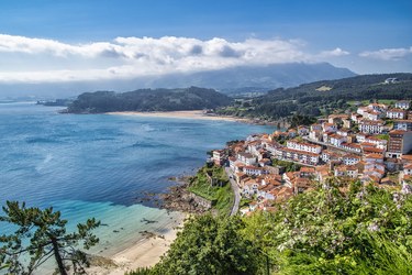 A coastal city and clouds in the background