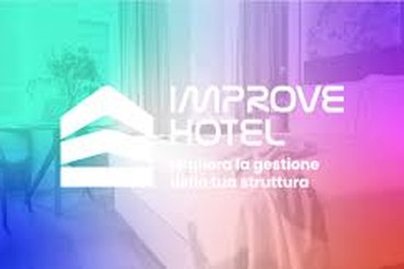 camera d'albergo con i colori di improve e titolo dell'evento